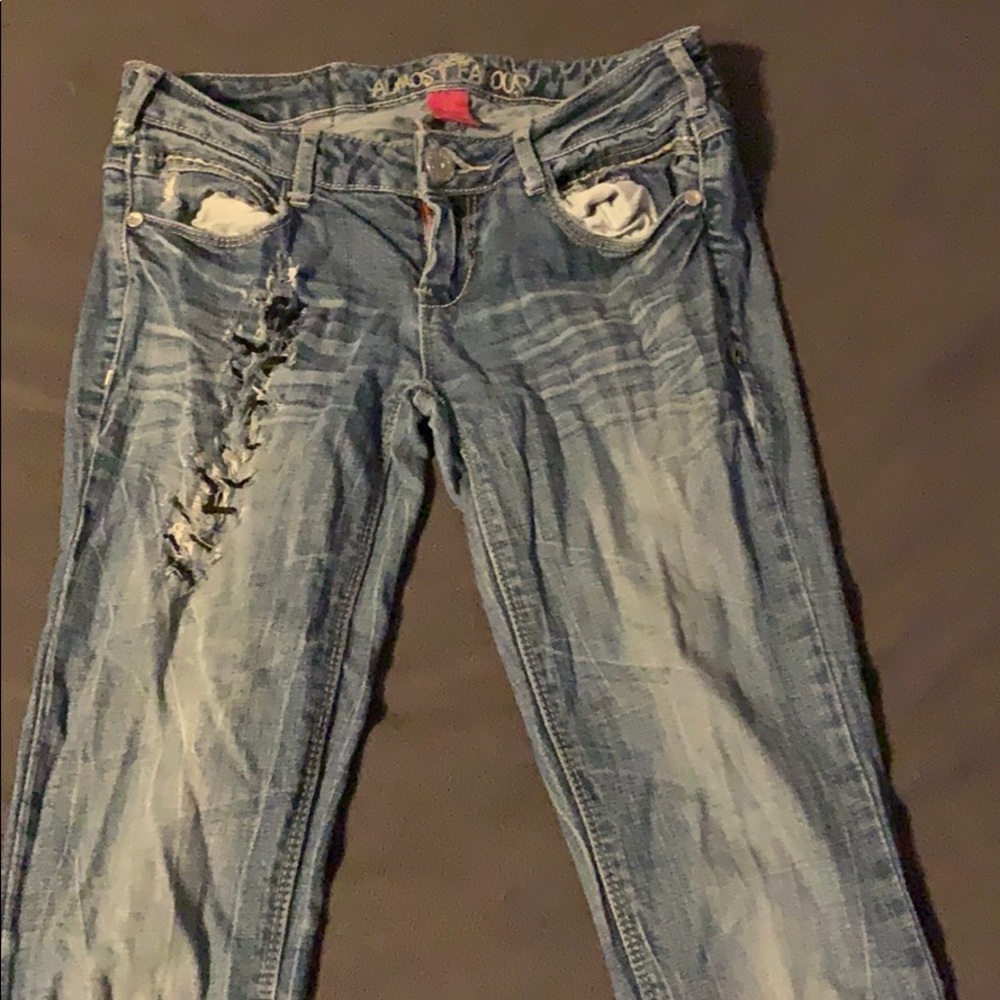 Ripped with sewn holes skinny jeans